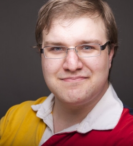 Tim Vollhoffer's Headshot from The 25th Annual Putnam County Spelling Bee